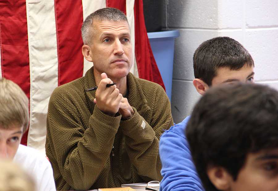 Wall Street Journal reporter Michael Philips sits in on Mr. Tom Clarks history class in August.