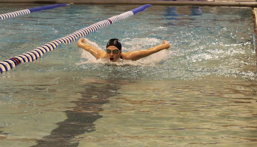 Stefanie Stefano (10) swims the butterfly stroke in the meet against LaPorte.  In this meet, the girls swam off-events, which are the races that they are not used to swimming.