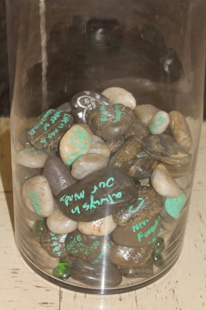 A pile of stones with memories of Jonathan Guzman sits in Mr. Tom Clark’s, Social Studies, room. Interact club is working on the vase as a project for the memory of Guzman.