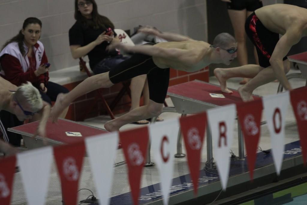  Matthew Applegate (10) jumps off the blocks after the start of the 200 Individual Medley. Applegate dropped a total of three seconds from his best time. 
