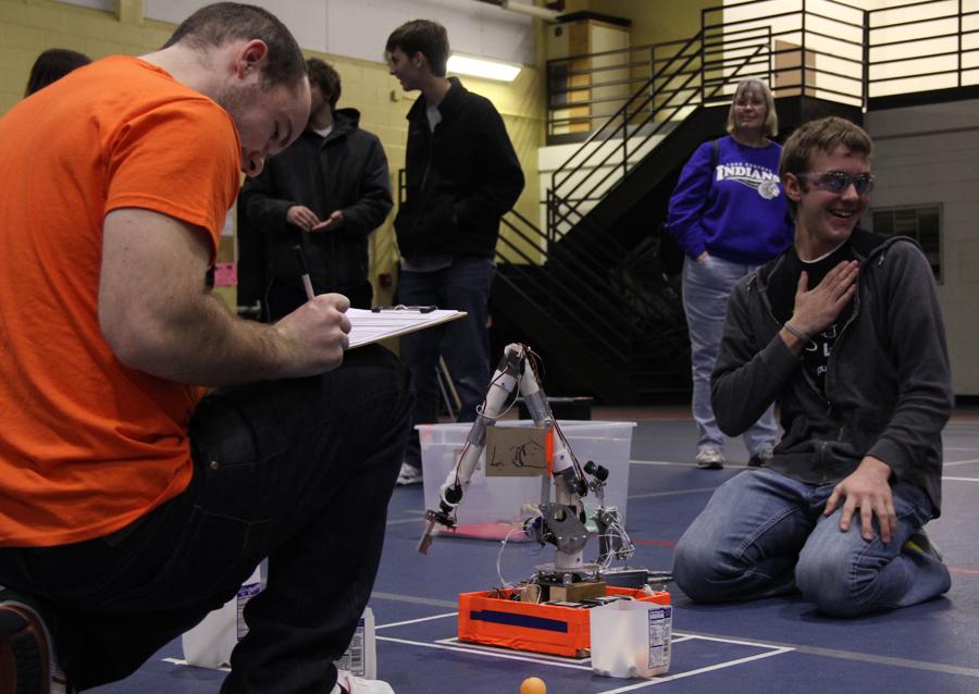 Daniel Shanks (12) takes a sigh of relief after finishing his event ‘robot arm.’  Shanks took first in this event at the St. Joseph’s Regional. 