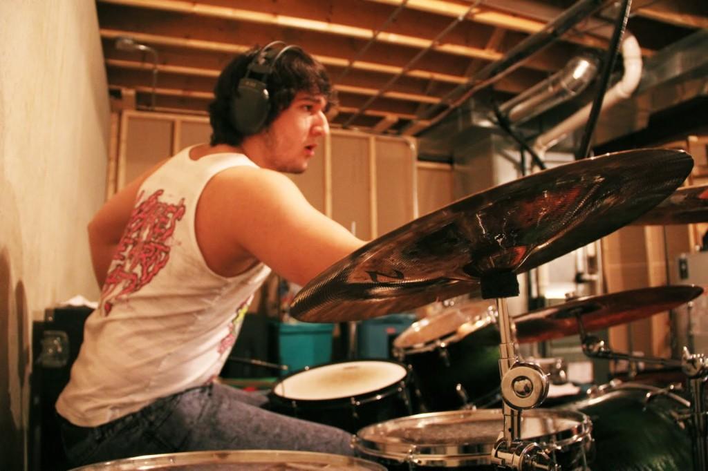 Jacob Quintnilla (12) playing drums in his band Containment.  They have a show the 15th. 
