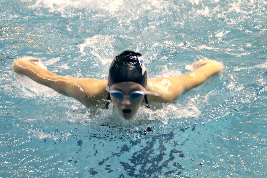 Ana Zanza (9) butterflies her way through the water on Tuesday’s meet.  It was the first meet of the season. 