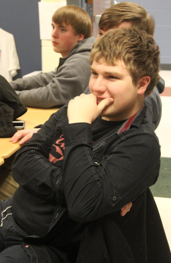 Jacob Mavity (11) laughs at Mr. Tom Clark’s joke.  All donations made to Operation Care should be turned in by March 5.