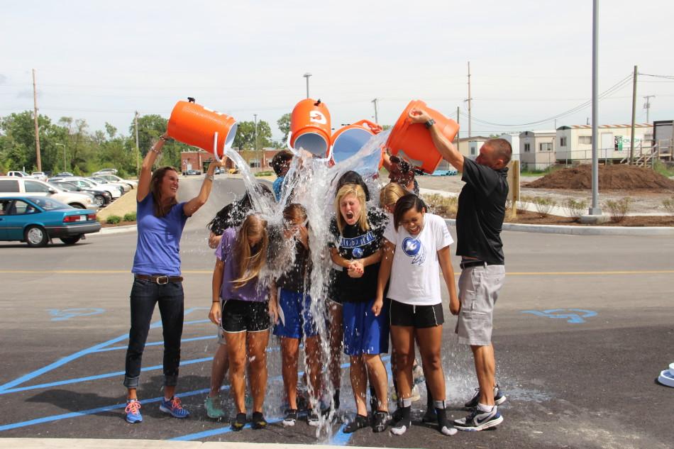 Ice Water gets dumped down the Lady Indians’ backs. The completed the ALS ice bucket challenge on Friday, Aug. 22 after school.
