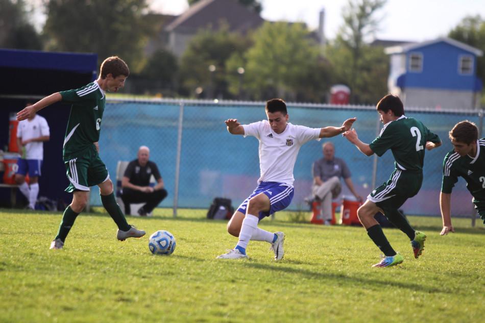 Bernardo Oseguera (11) fights for the ball. The Indians played Valparaiso for the DAC championship, and the Indians won.