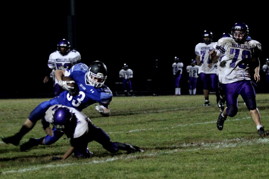 Ryan Voss (9) slides in attempt to run the ball into the endzone. The next game was scheduled for Saturday, Oct. 18.