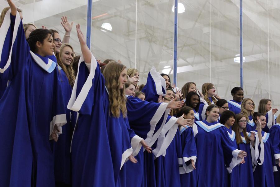 The Junior Treble Choir ended the song “Here Comes Santa Claus” on an excited note.  The group put on dozens of cheerful facial expressions and hand movements during the song.
