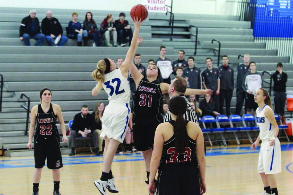  Rachael Robards (9) hits the ball toward the opposing basket for her teammates. The final score was 62-6.