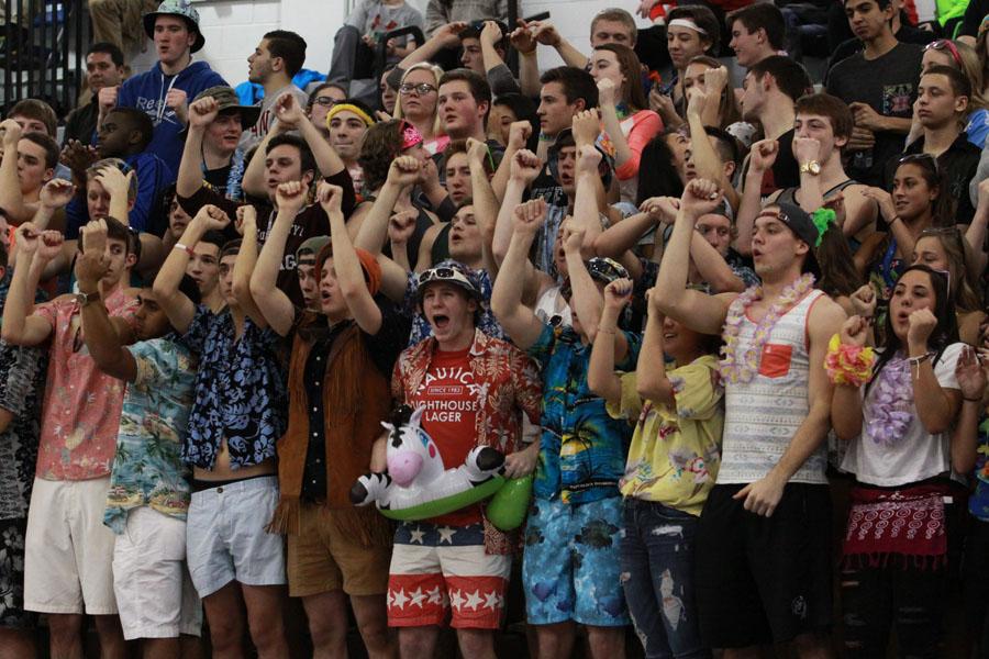 The+student+section+goes+crazy+after+Frank+Dijak+%2811%29+scored+his+second+free+throw.+Students+were+told+to+dress+up+for+a+beach+theme.