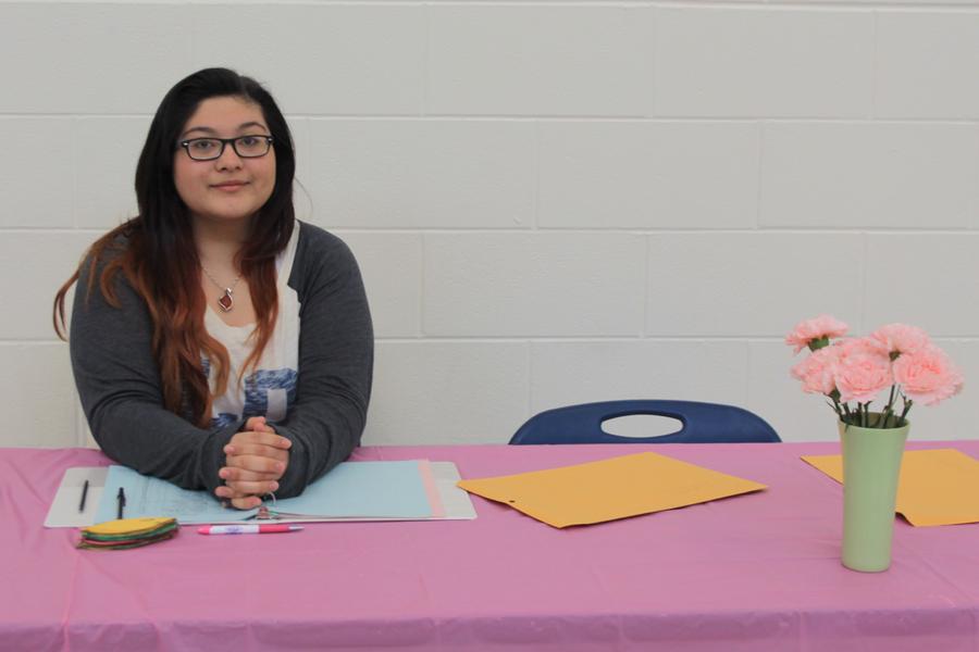Dyanna Munoz (12) volunteers her time to Interact Club by selling carnations. Interact Club has been organized by Mr. Tom Clark, Social Studies. 