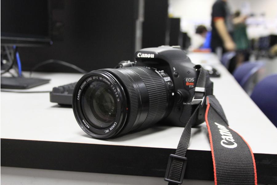A Canon camera sits on a desk in room 9114.  Photography is offered to grades 9-12 and is a one semester course. 