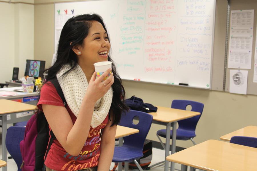 Dianne Cometa (10) enjoys her refreshments before the exam. The students were given refreshments before the test by both French teachers.