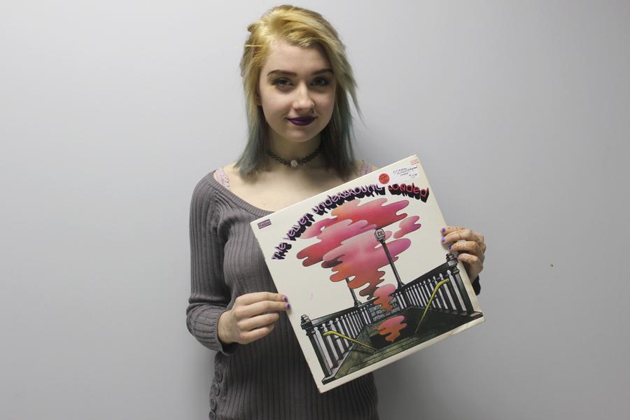 Evelyn Reder (10) works at local record store “Rock Goes the Easel.” Reder found the job through a friend while looking for a place to showcase her art.