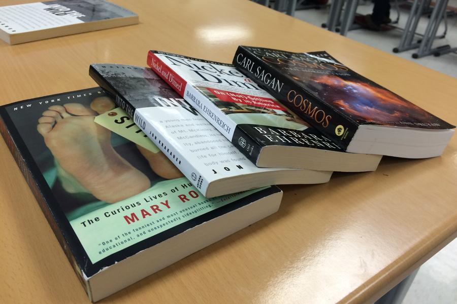  The outside reading books for AP English 11 are pictured on a desk in C318. Students were given the option to pick from a list of four books each semester. (Not pictured: Freakonomics, Fast Food Nation, In Cold Blood and Henderson the Rain King).