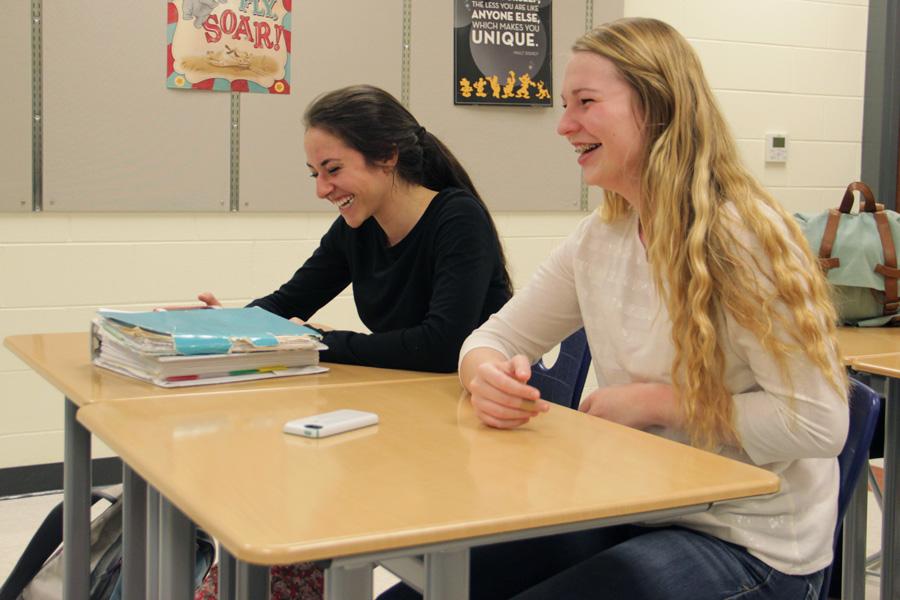 Rachel Gross (11) and Julia Gruver (11) laugh over the discussion at the Junior Class Cabinet meeting. Junior Class Cabinet met on April 15 to discuss Prom.
