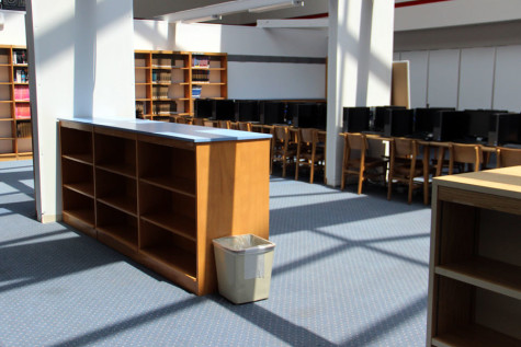 Shelves located in the temporary library are being packed up.  The new library is expected to open at the beginning of next school year.