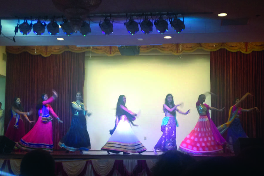 The girls of the HUM group take to the stage during the HUM group performance. Payal Bhatt (10) was on the far left.