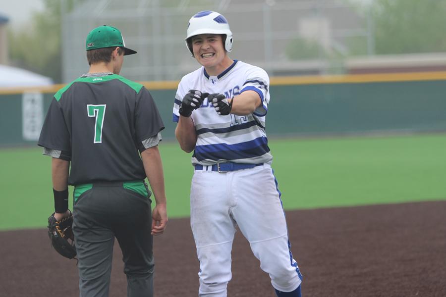 Zachary Turnbough (11) pumps his fist after hitting a triple. The triple was Turnbough’s twelfth on the season, and he tied the Indiana state record for triples in a season.