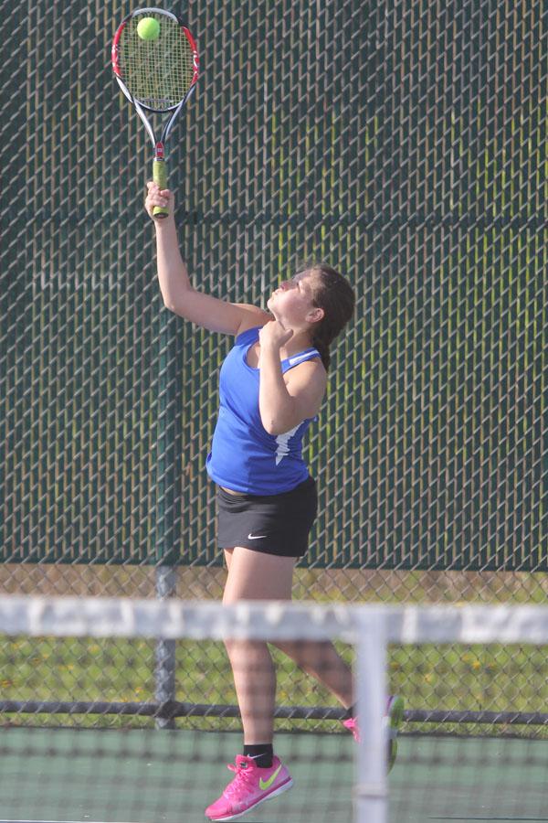 Anna Wachowski (10) serves the ball to her Munster opponent. The matches were not concluded due to a lack of sunlight to last during the prolonged matches.