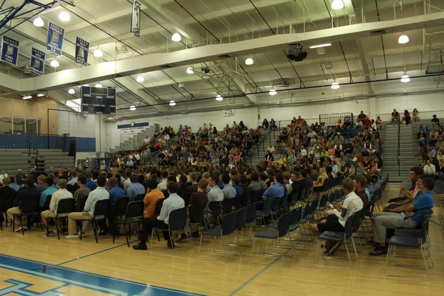 Athletes and parents sit in the gymnasium to see the spring sports award ceremony. Coaches from each sport spoke about their team’s accomplishments.