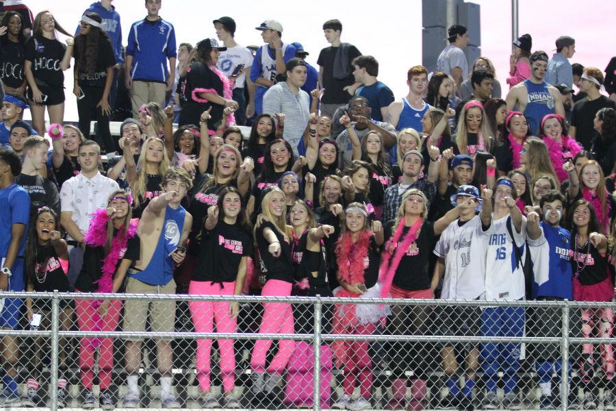 The+student+sections+shows+their+school+spirit.+Senior+girls+wore+pink+and+black+while+other+student+followed+the+blue+and+white+theme.