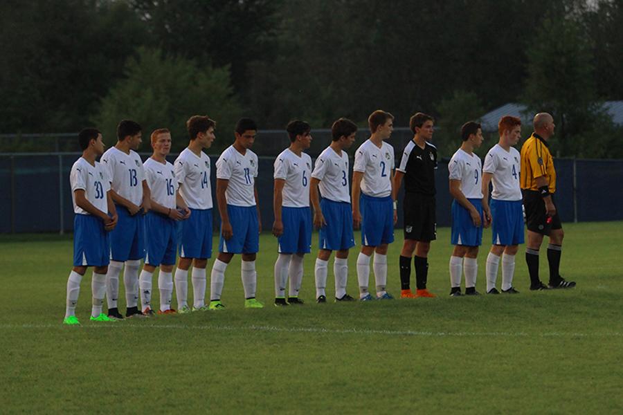 The varsity boys soccer team lines up for player introductions before their game against the Munster Mustangs. The Indians won with a final score of 4-3.