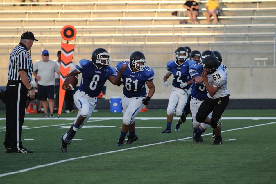 Quincy Tribble (9) directs his blockers while running the ball down field. The boys beat the Panther 29-6.