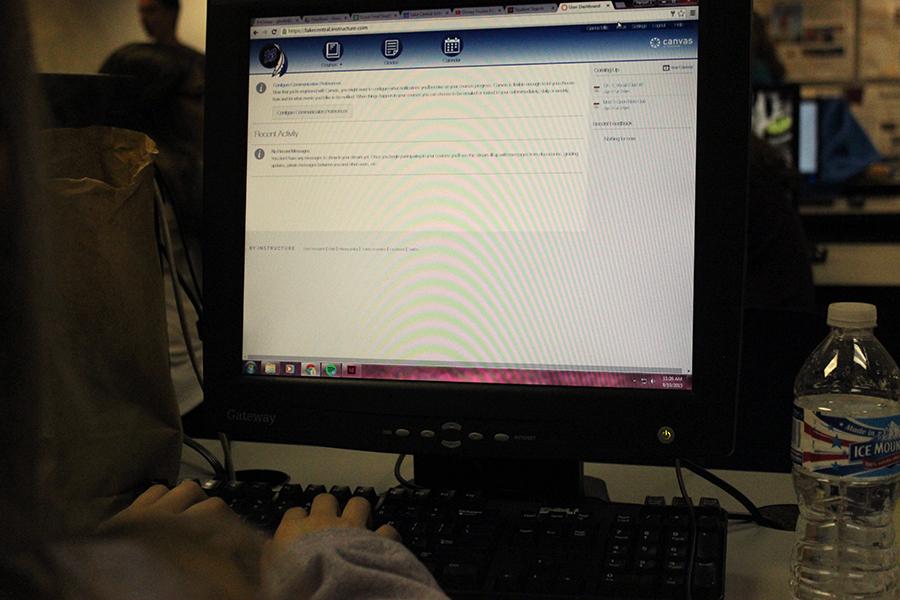 A student logs into her Canvas account. An account was distributed to each student this year after the removal of My Big Campus. 