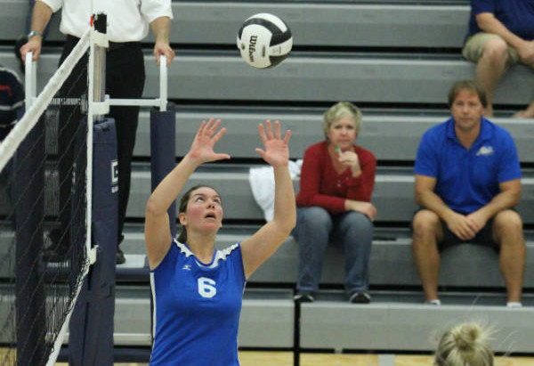 Stephanie Spigolon (12) sets the ball to Jacqueline Eader (12) for her to hit. Although the season is coming to an end, the girls still have many important matches to come.