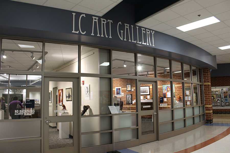 Visitors admire the artwork inside the Lake Central Art Gallery. The Art Gallery opened this year. 