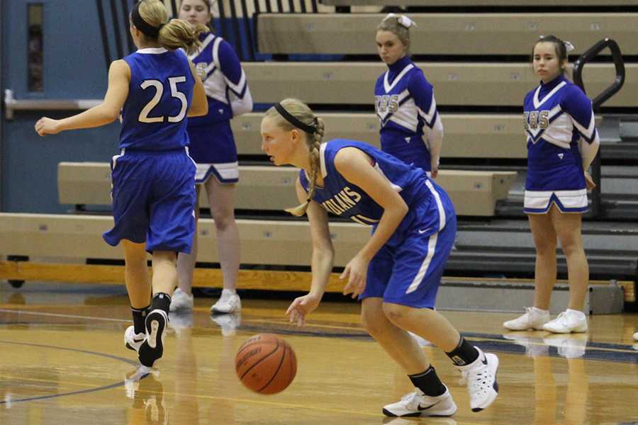 Stephanie Dijak (9) gets in position to pass the ball. This is Dijak’s first year playing in high school.