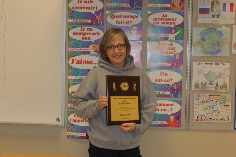 Mrs. Nancy Tilka, World Language, poses with her award. Mrs. Tilka has been teaching French on and off since 1983.