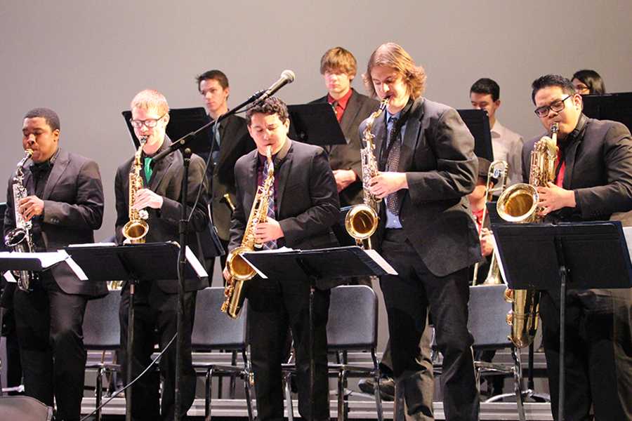 The saxophone section stands up during part of their jazz performance.  The Purdue Jazz Festival is considered to be Indiana’s biggest jazz festival.