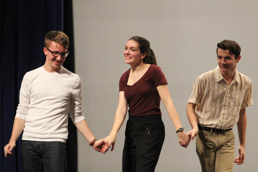 Adam Gustas (11), Aaron Capello (10) and Hannah Souronis (11) dance at rehearsal on Jan. 16. They sang ‘Under The Sea’ and rehearsed choreography.

