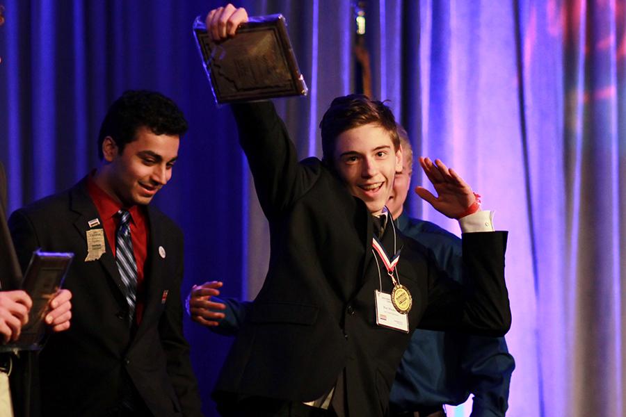 Matthew Matakovic (10) celebrates his second place award with the dance move, “The Dab.” Matakovic placed in C++ Programming. 