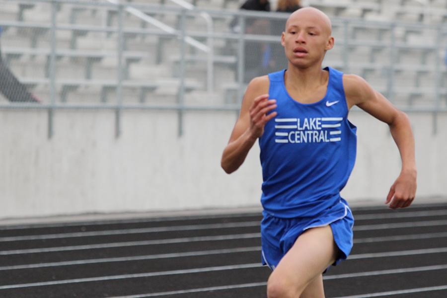 Isaac Beatty (9) runs the 800-meter race.  The meet was April 19, 2016.