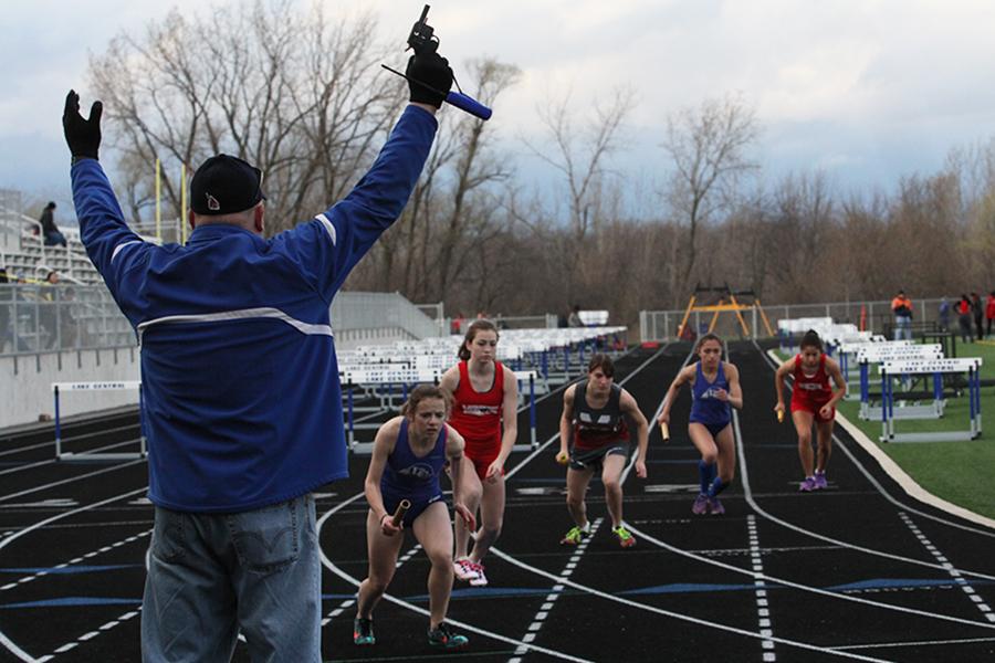 The competitors prepare to run as the signal shot is fired. The meet took place on Friday, April 1.