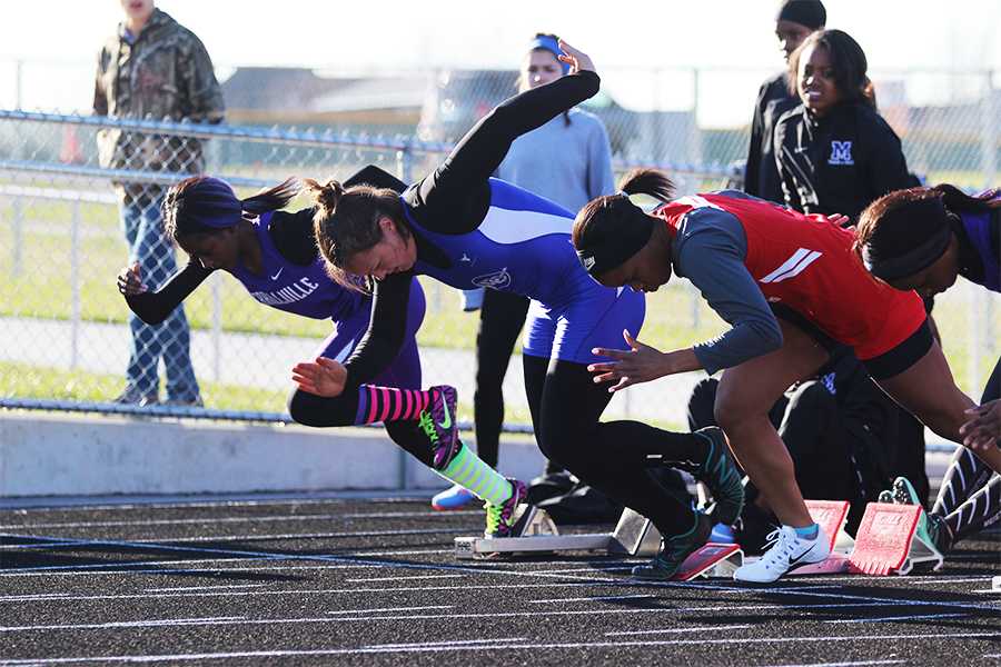 Katelyn Rusiniak (10) takes off to an early lead against Merrillville and Crown Point in the 100-meter sprint. Rusiniak also participated in the long jump, 200-meter sprint and the 4x100 relay.
