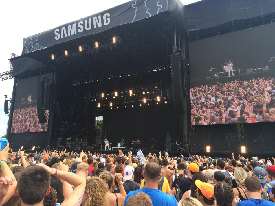 Fans stand and listen to X Ambassadors at the Samsung stage. This was the biggest stage. 
