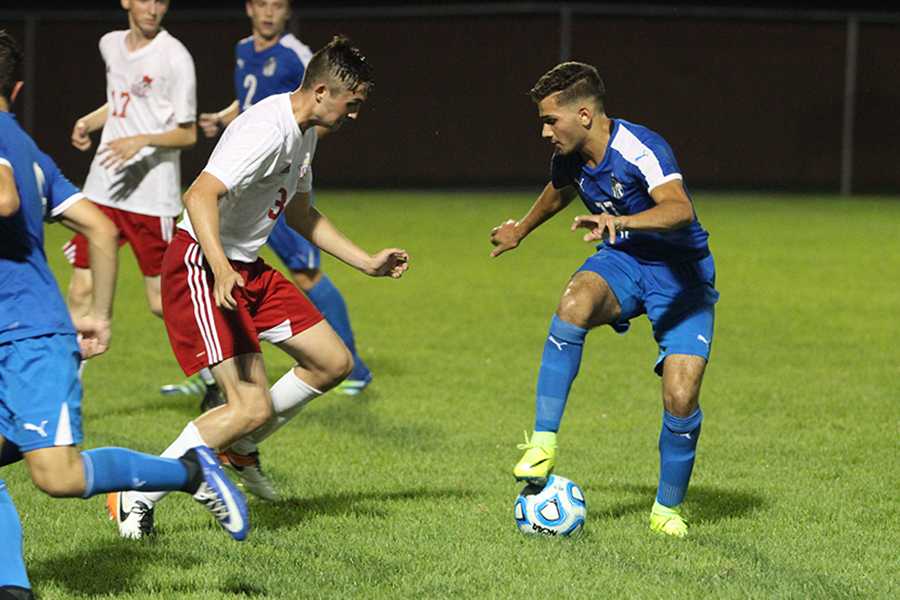 Naser Tahahwah (12) plays the ball. The Indians won with a score of 5-1 against the Crown Point Bulldogs.