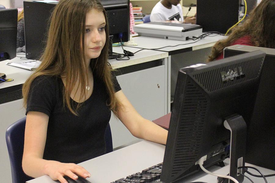 Drew Ireland-Shead (10), a foreign exchange student, works on a project in her Introduction to Journalism class. Ireland-Shead came from Australia to spend the semester in America.
