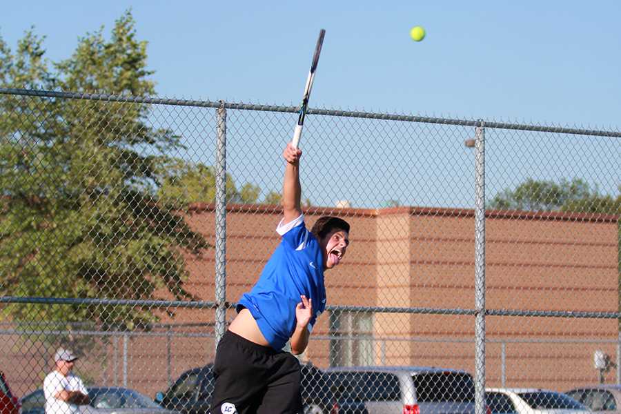 Andrew Walsh (10) plays for the varsity tennis team for the second year in a row. Walsh made the Varsity team as a freshman.
