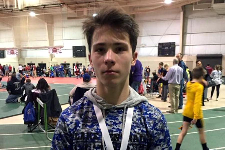 Jacob Rocca (10) poses with his medal after a wrestling match. He earned a third place medal off season over the summer.  Photo submitted by Jacob Rocca
