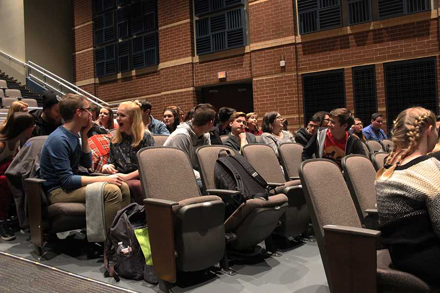 Students wait in the auditorium. The auditioners waited for the judges to all join. 