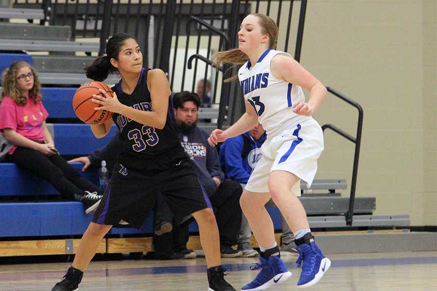 Brooke Czaja (9) guards her opponent during the third quarter. The defense only let Hobart score two points the entire game.  
