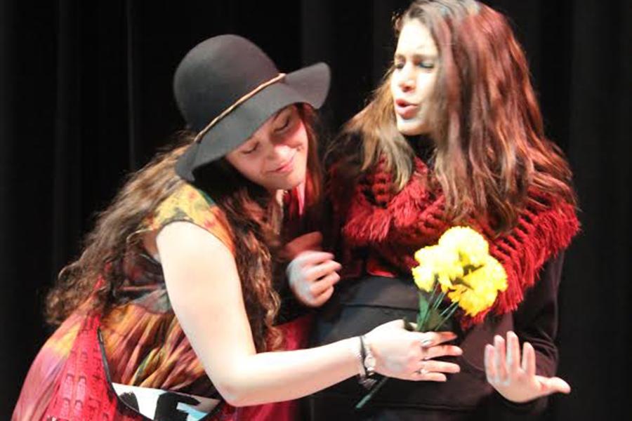 Erica Habas(10) and Natalie Bivona(10) star in one of Advanced Theatre’s student directed shows. They perform the play While their teacher, Pamela Neth, grades them.