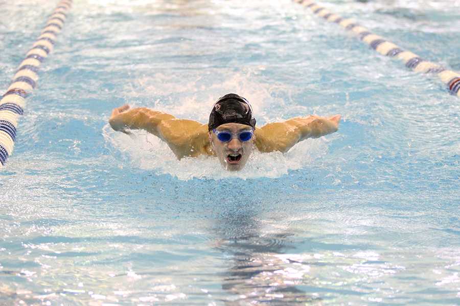 Jack Tinsley (10) is swimming butterfly style. Tinsley swam the 200 IM.
