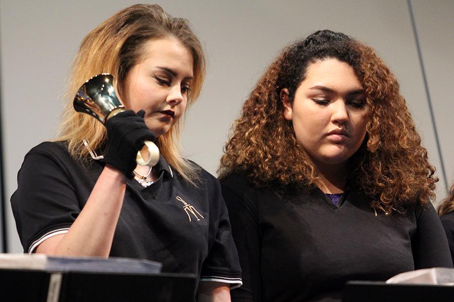 Taylor Lush (11) and Amanda Aponte(11) perform at the bells concert. Both students were in Bells II. 
