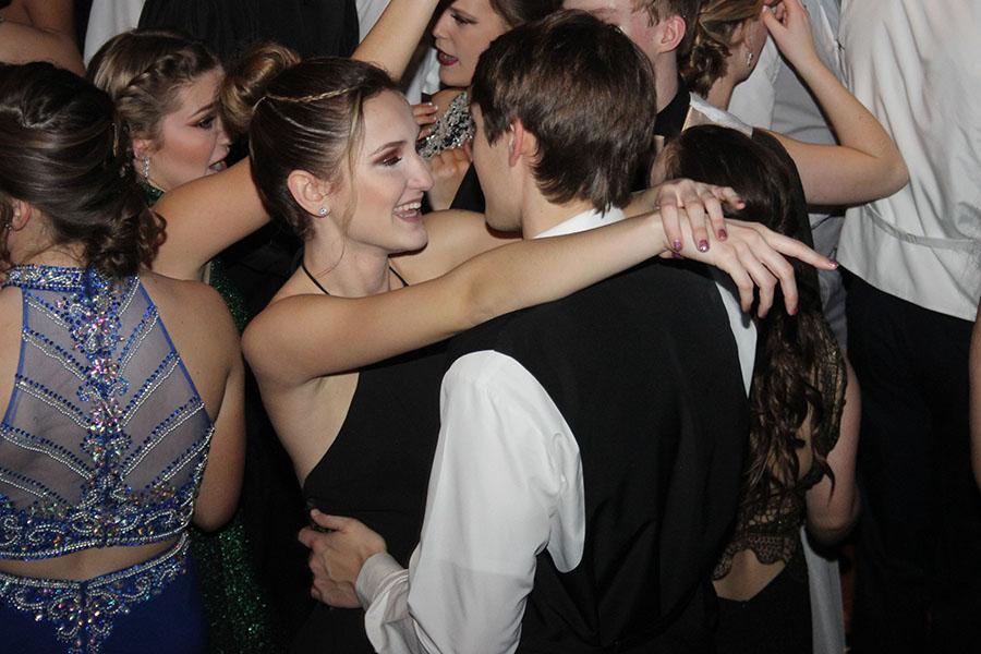 Hayley Skrezyna (11) and Payton Sanders (11) slow dance together. Lake Central’s Winter Formal took place on Jan 21.